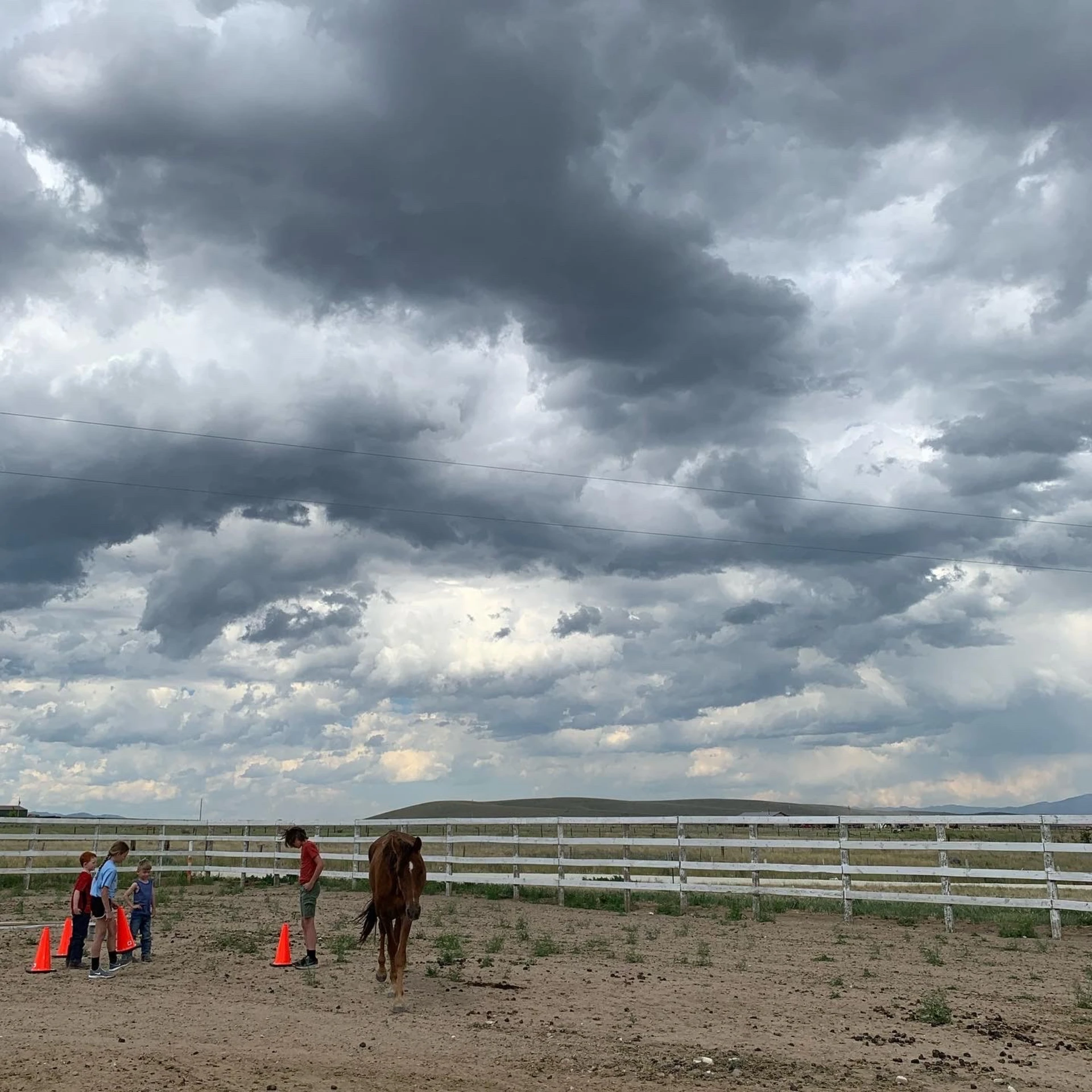 Ranch landscape with stormy clouds