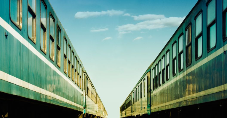 two trains on opposite tracks