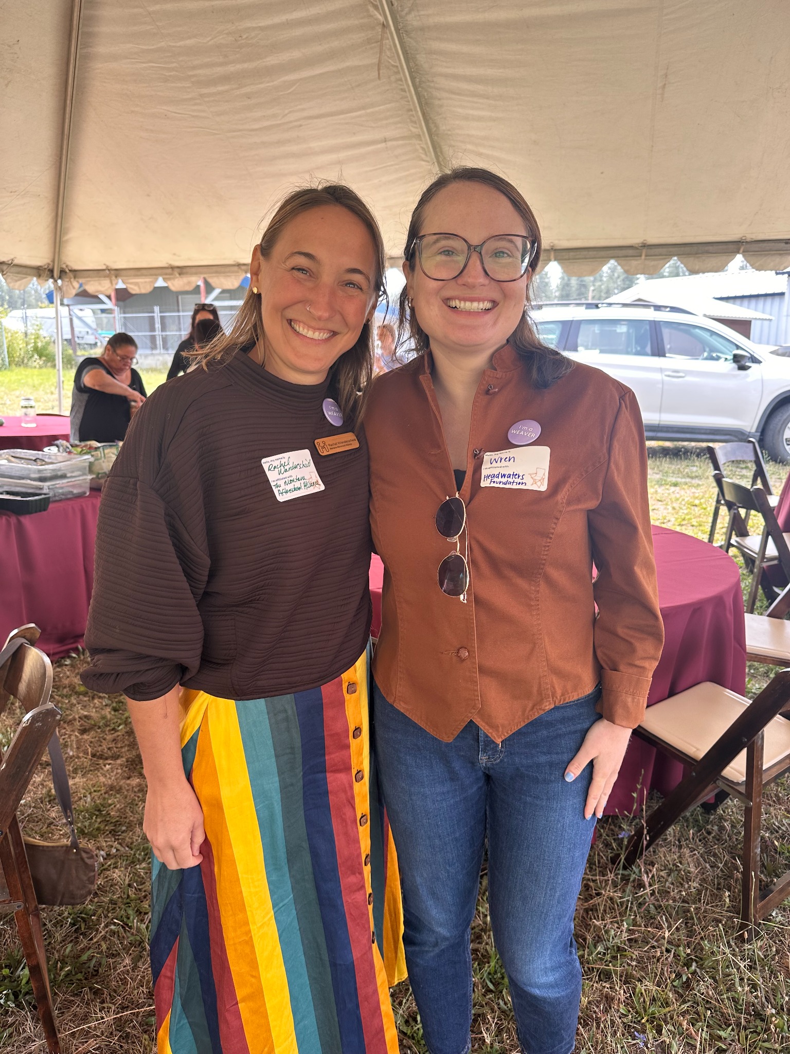 Two women pose for a photo